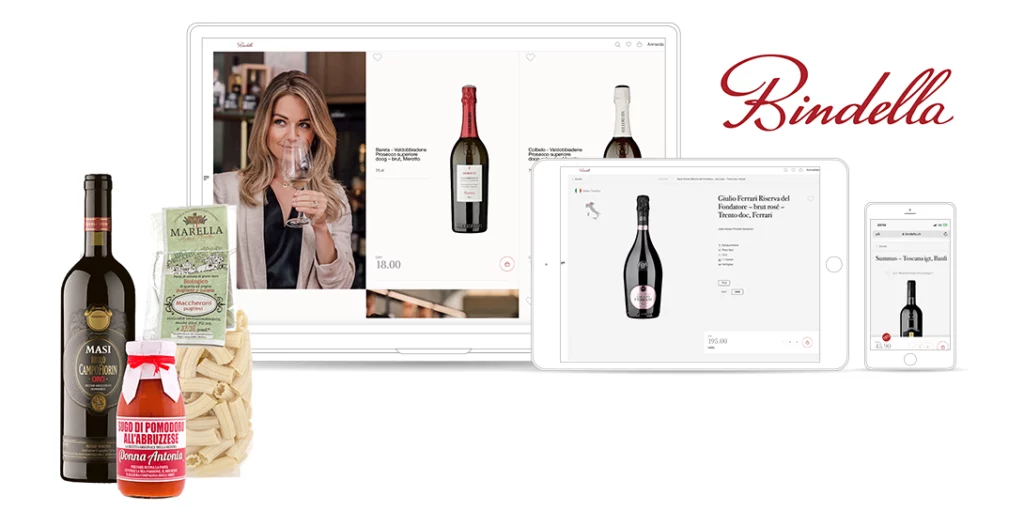 Laptop, Tablet und Smartphone mit Abbildungen aus dem Onlineshop von Bindella und Produkt-Paket mit Wein, Nudeln und Sauce